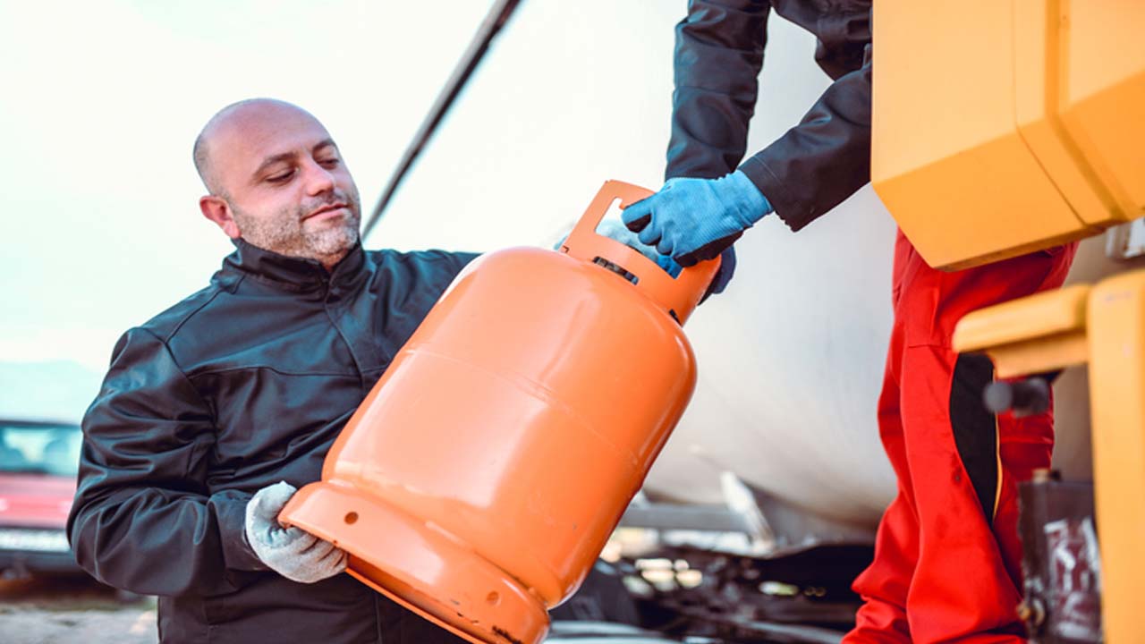 Loading Gas Cylinder On To Tanker Truck